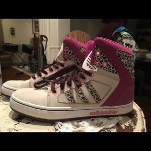 Adidas high tops in animal print. Well loved.